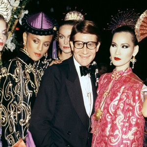 A Roxanne Lowit photo of Yves Saint Laurent and models.