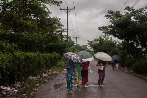 Garment factory workers walk to work