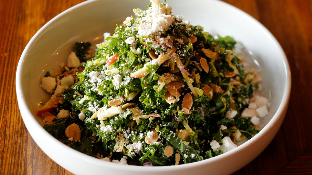 The Pomeroy's kale and brussel sprouts with toasted almonds, ricotta salata, apple, red onion.