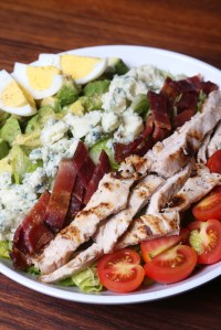 Cobb Salad: Rotisserie Chicken, Egg, Bacon, Avocado, Bleu Cheese & Meyer Lemon Vinaigrette