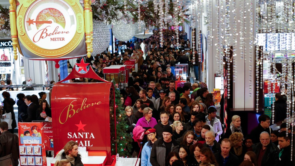 Customers stream into Macy's flagship store in Herald Square