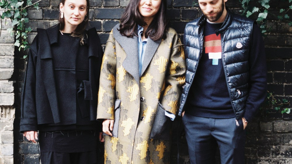 Phoebe English, Rejina Pyo Alexander Lewis and his pooch, Ryo, wearing a Goyard collar.