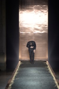 Alessandro Sartori taking a bow at his last Berluti show in Paris