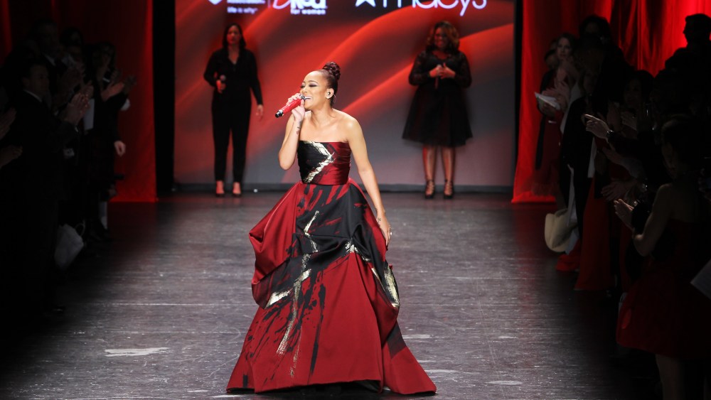 Monica performs on the catwalk at Red for Women