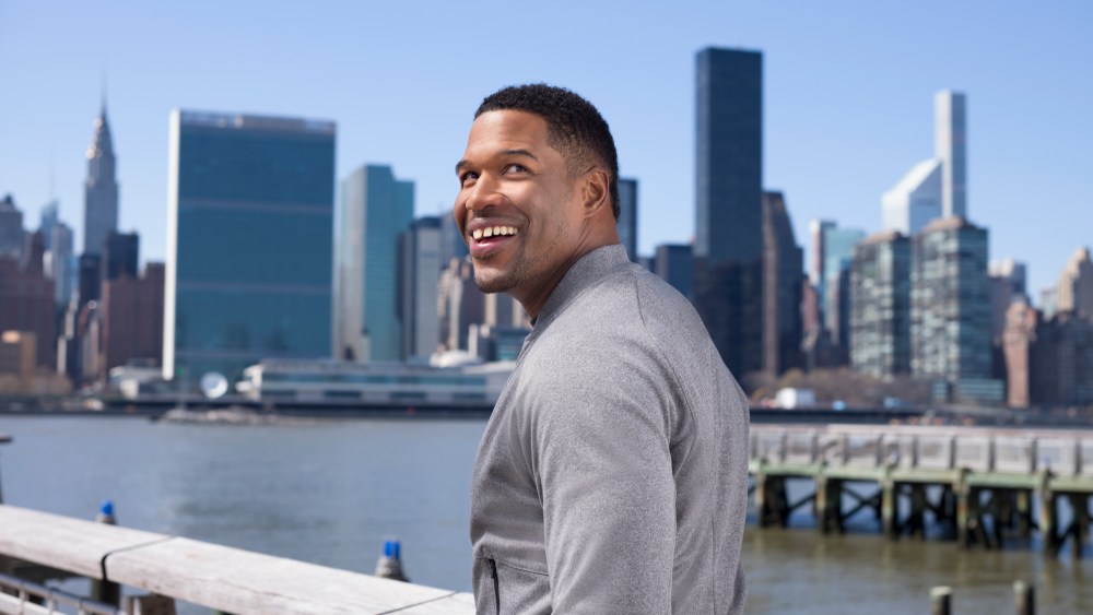 Michael Strahan wearing a look from MSX.