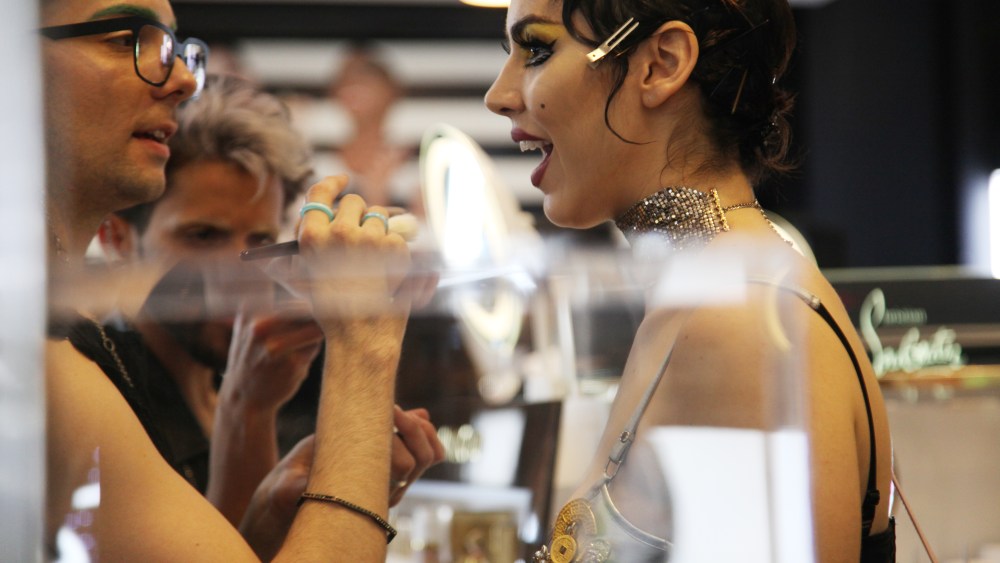 A guest having her makeup done.