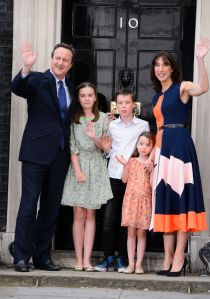 Cameron gave a short farewell speech flanked by his wife Samantha, who was wearing a multi-colored sleeveless dress by Roksanda.