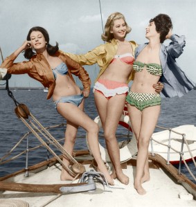 Young ladies wearing bikinis on a boat off the Atlantic coast, end of the 1950s.