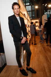 Uri Minkoff at the Rebecca Minkoff booth.
