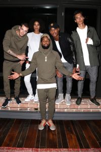 Odell Beckham Jr. with models