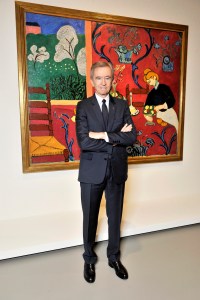 Bernard Arnault in front of the painting “Red Room (Harmony in Red)” (1908) by Henri Matisse.