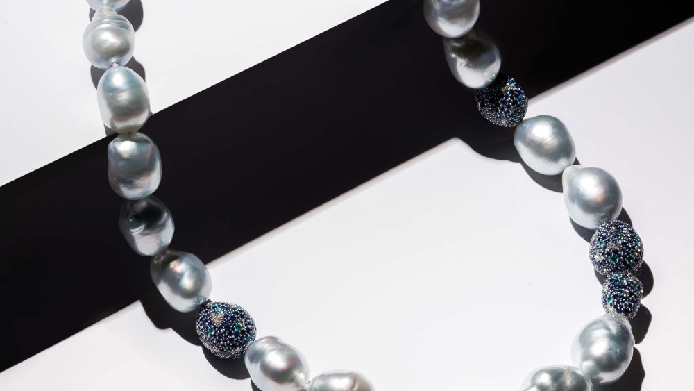 Mikimoto’s 18-karat white gold, south sea pearl, diamond, tourmaline and sapphire necklace.