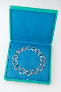 Necklace of pavé diamonds and multicolored stones set in platinum.