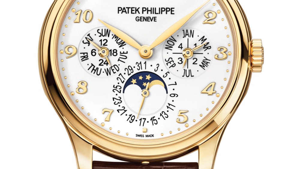 The men’s Perpetual Calendar in yellow gold with ivory lacquered dial and shiny alligator strap.