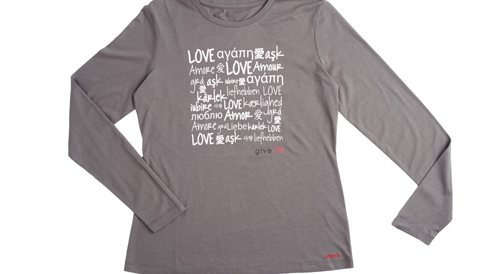 The T-shirt features the word "love" in 16 languages.