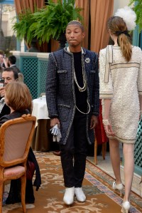 Pharrell walks the Chanel Métiers d'Art show at the Ritz