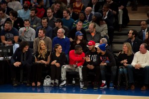 Howard stern, Tracy Morgan, and Odell Beckham sitting in court seats.