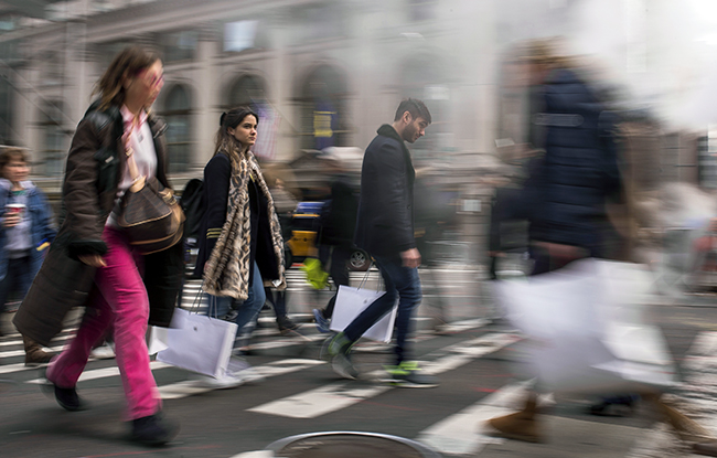 Shoppers were out at the stores, and using their phones to price check.
