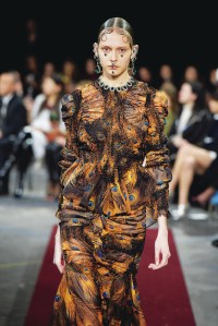Rare AvisGenuine fashion has been on the endangered species list this season. A rare sighting came at Givenchy, where Riccardo Tisci drew from a pair of disparate influences u2014 Victoriana and the aggressive flamboyance of Latin American chola girl style u2014 for a collection that was an exquisite expression of moody chic. Here, his peacock print beauty. For more from the shows, see pages 4 to 7.