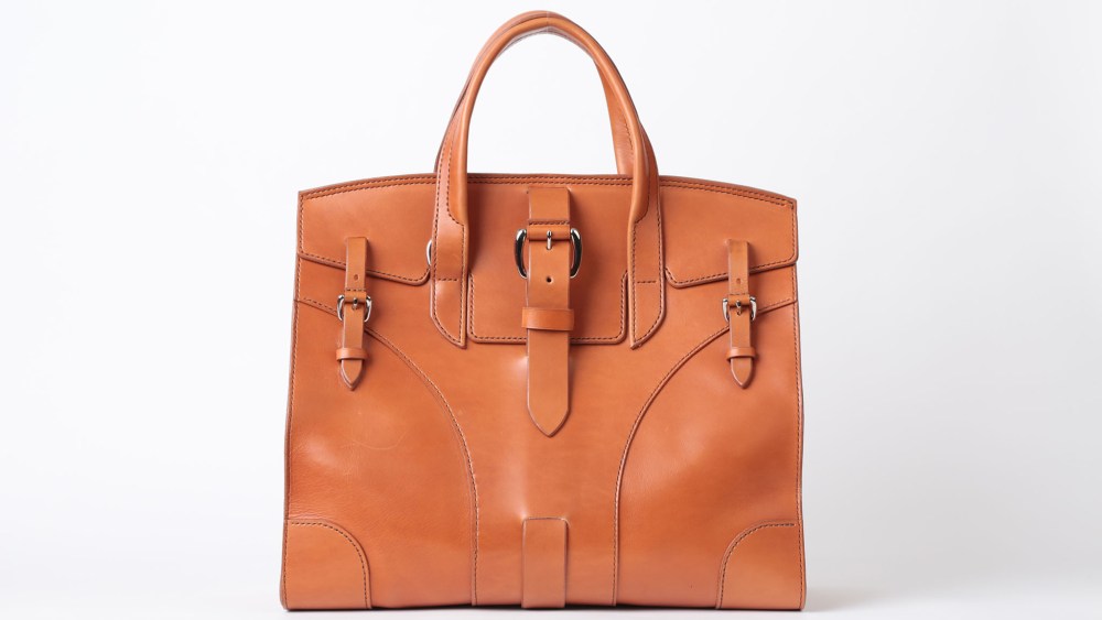 slightly Alabama’s highwayman bag.
