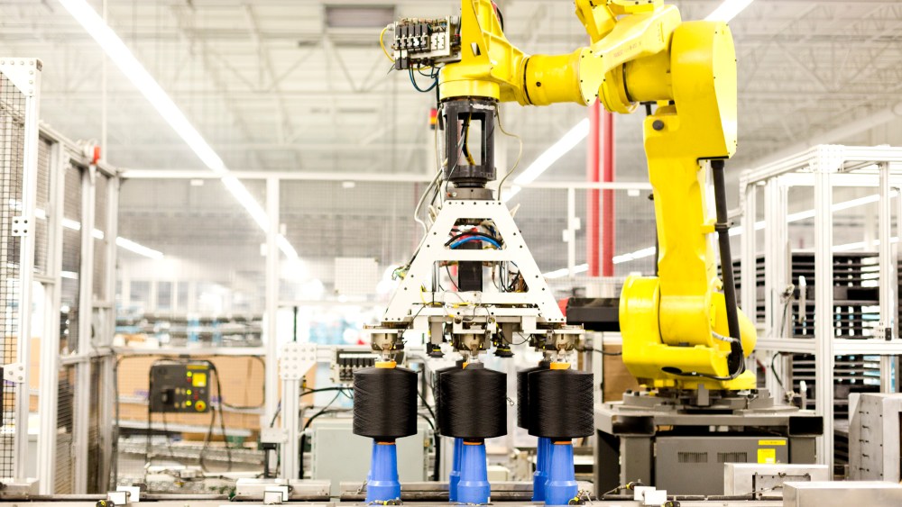 Robotic yarn processing at Yadkinville.