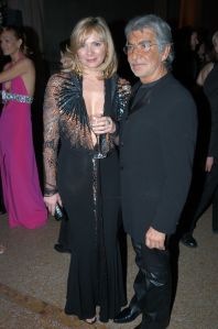 (L-R) Actress Kim Cattrall and designer Roberto Cavalli attend the Costume Institute Benefit Gala: 'Party of the Year' at the Metropolitan Museum of Art in New York City.2003 Met Costume Institute Gala, New York