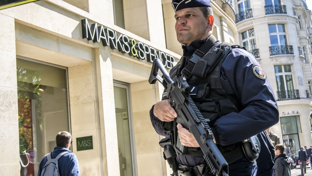 A French policeman patrols at the Champs Elysee avenue in Paris, 21 April 2017. A police officer the previous day was killed along with the attacker in a terror attack on the Champs Elysees. A total of three police officers were shot at on the city's famous boulevard, with their suspected attacker killed by security forces.Attack on Champs Elysees aftermath, Paris, France - 21 Apr 2017