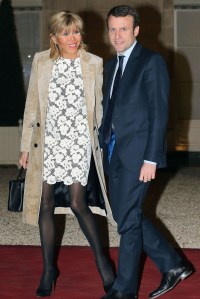 Emmanuel Macron, Brigitte Trogneux French Economy Minister Emmanuel Macron, right, and his wife Brigitte Trogneux arrive at the Elysee presidential palace in Paris to attend a state dinnerFrance Emmanuel Macron, PARIS, France
