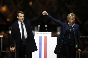 Copyright 2017 The Associated Press. All rights reserved. This material may not be published, broadcast, rewritten or redistributed without permission.Mandatory Credit: Photo by AP/REX/Shutterstock (8792187br)French President-elect Emmanuel Macron holds hands with his wife Brigitte during a victory celebration outside the Louvre museum in Paris, France,. Speaking to thousands of supporters from the Louvre Museum's courtyard, Macron said that France is facing an "immense task" to rebuild European unity, fix the economy and ensure security against extremist threatsElection, Paris, France - 07 May 2017