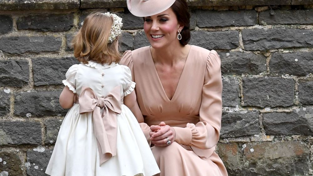 Duchess of Cambridge and Princess Charlotte at the wedding of James Matthews and Pippa Middleton