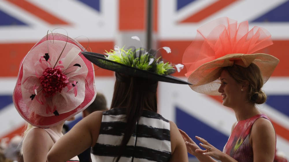 Racegoes chat as they wait for the racing to begin on the third day of the Royal Ascot horse race meeting, which is traditionally known as Ladies Day, in Ascot, EnglandBritain Royal , Ascot, United Kingdom - 22 Jun 2017