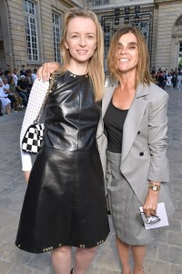 Delphine Arnault and Carine Roitfeld front row at Berluti