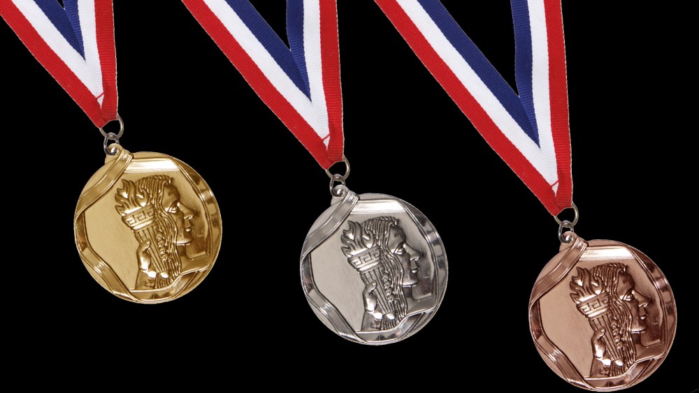 Gold, silver, and bronze medals.