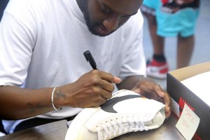 Virgil Abloh signing Nike trainers