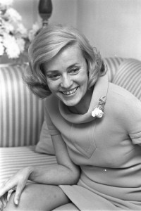 Jeanne Moreau in cowl-neck minidress
