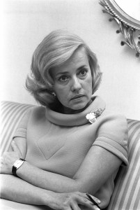 Jeanne Moreau in cowl-neck minidress
