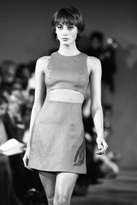 Christy Turlington modeling a minidress with cutout midriff from Michael Kors' Ready-To-Wear spring 1991 collection.