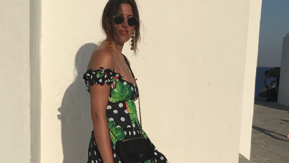 WWD Postcard: Caroline Constas in Greece