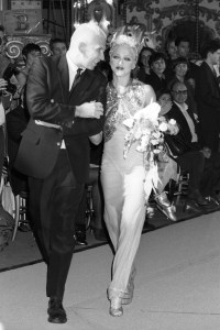 Outtake; Jean Paul Gaultier and Madonna on the runway of Gaultier's Ready-To-Wear Spring 1995 show in the Musée des Arts Forains in Paris on October 16, 1994Article title: "Gaultier's Time Machine"