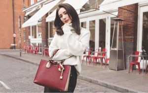 One of China's most popular actresses, Yang Mi, models a Mercer handbag from Michael Kors, exclusively available at DFS. The special collaboration with the duty free retailer launches Sept. 1st.