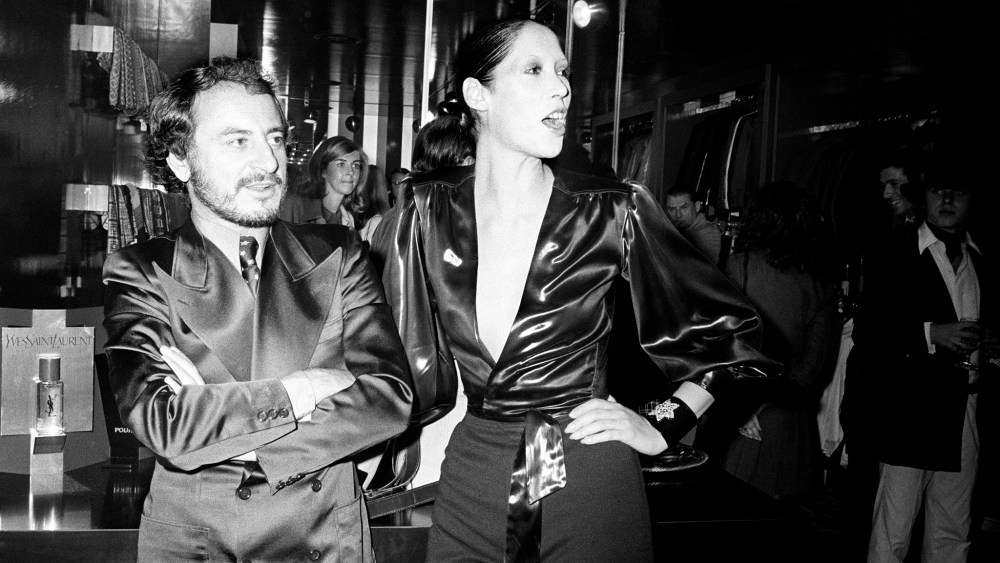 Pierre Berge and Marina Schiano attending the Yves St. Laurent Rive Gauche Boutique pour Homme opening on October 6, 1971 in New York.