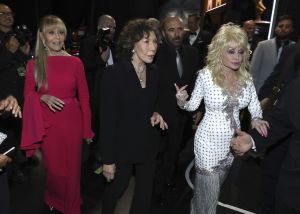 Jane Fonda, Lily Tomlin, Dolly Parton. Jane Fonda, from left, Lily Tomlin and Dolly Parton appear backstage at the 69th Primetime Emmy Awards, at the Microsoft Theater in Los Angeles69th Primetime Emmy Awards - Insider, Los Angeles, USA - 17 Sep 2017