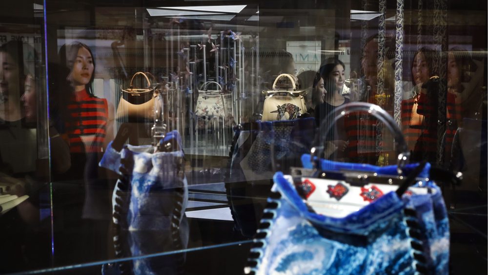 Luxury handbags on display in Beijing. Around 8 percent of Chinese luxury purchases are made online.