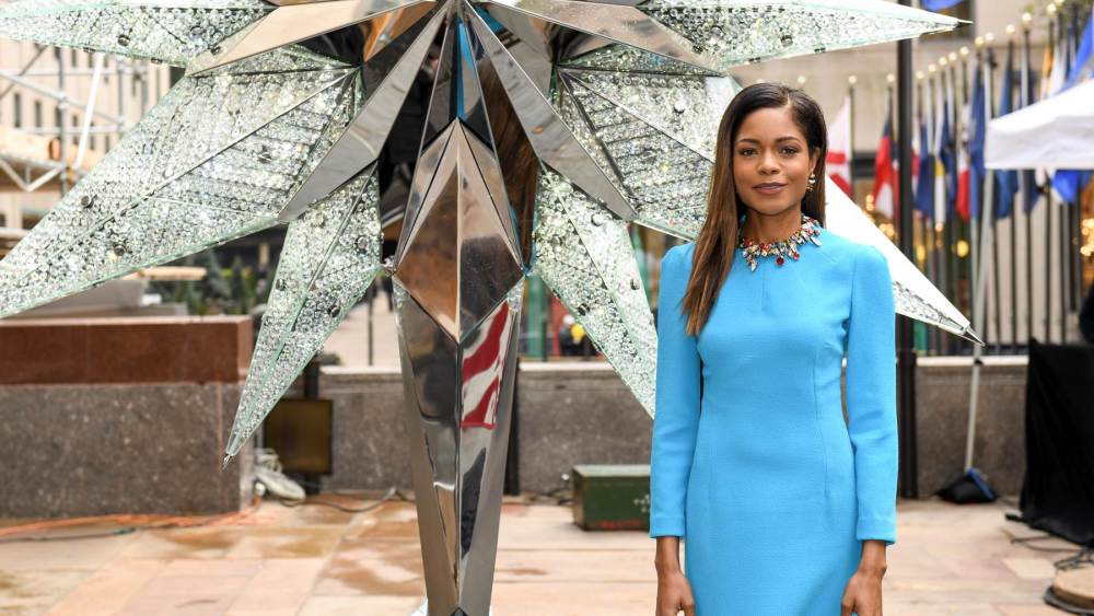 Naomie Harris Raises Swarovski Star in Rockefeller Center