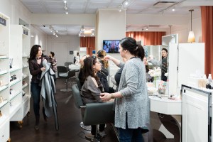 Meredith Waga Perez gets a "full face" makeup application from Blushington artist Marie Bullock.