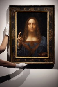 Leonardo da Vinci's "Salvator Mundi" on display at Christie's auction rooms in London. The rare painting of Christ, which that sold for a record $450 million, is heading to a museum in Abu Dhabi. The newly-opened Louvre Abu Dhabi made the announcement in a tweet on Wednesday, Dec. 6Leonardo Auction Abu Dhabi, London, United Kingdom - 24 Oct 2017