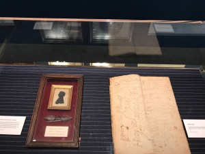 A silhouette and eyeglasses are the only artifacts left from Henry Sands Brooks; the original ledger.