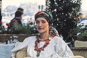 Loulou de la Falaise sitting in an outdoor cafe, 1976.