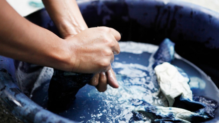 Person with indigo vat