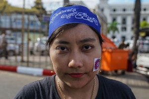 Khin Thandar Win, 26 years old garment factory worker from Myat Star Factory from Bago participating in the March.